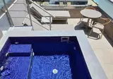 Sea Breeze Santorini Beach Resort, Curio Collection by Hilton foto 6