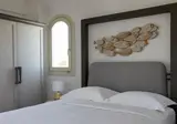 Sea Breeze Santorini Beach Resort, Curio Collection by Hilton foto 11
