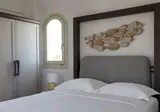 Sea Breeze Santorini Beach Resort, Curio Collection by Hilton foto 14