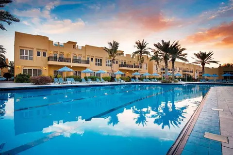 Al Hamra Village Hotel in Nando's — foto 10