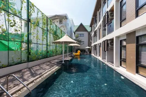 Outrigger Surin Beach Resort in ตำบลเชิงทะเล — foto 16