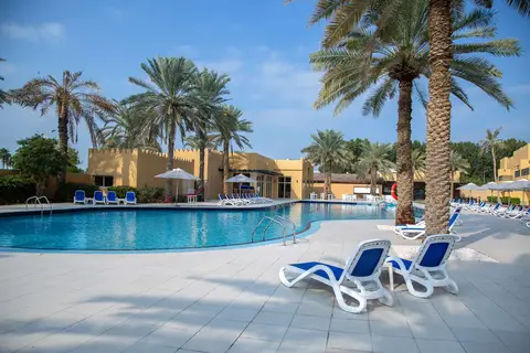 Al Hamra Village Hotel in Nando's — foto 27