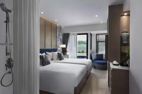 Outrigger Surin Beach Resort in ตำบลเชิงทะเล — foto 13